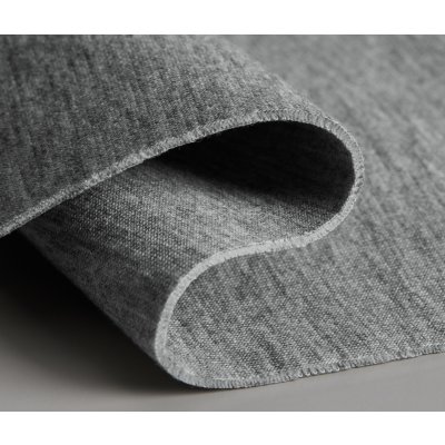 2枚の生地を中糸で繋ぎあわせた多重構造のダンボールニット生地（断面図）