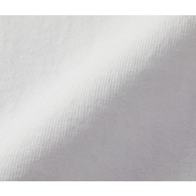 オープンエンド糸を高密度に編みこんだ、固めで粗野感のある生地